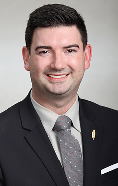 Minister Honourable Christopher Mitchelmore